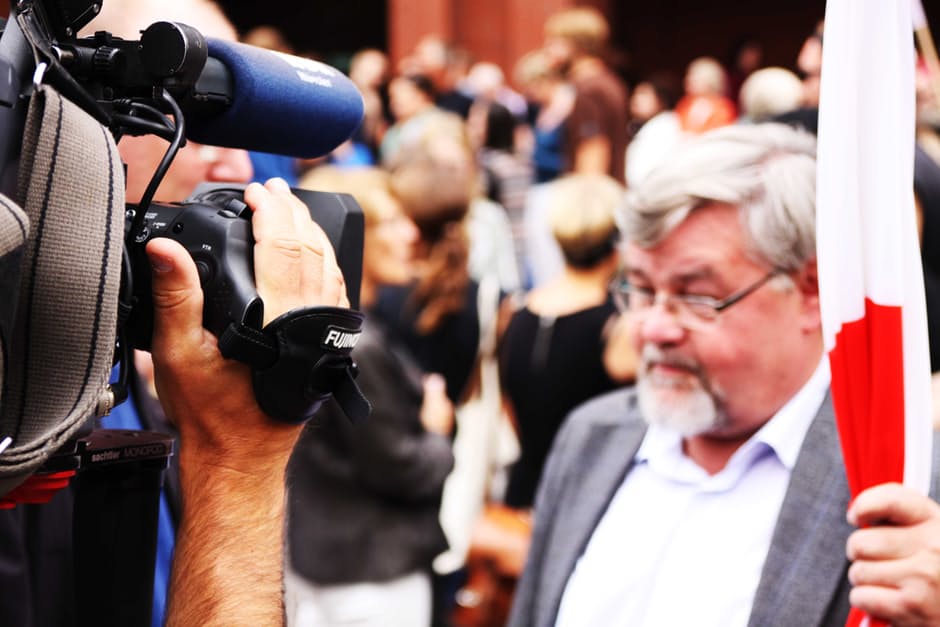 academic-activist-tv-camera-interview