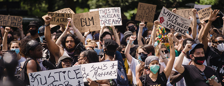 crowd-of-protesters-holding-signs