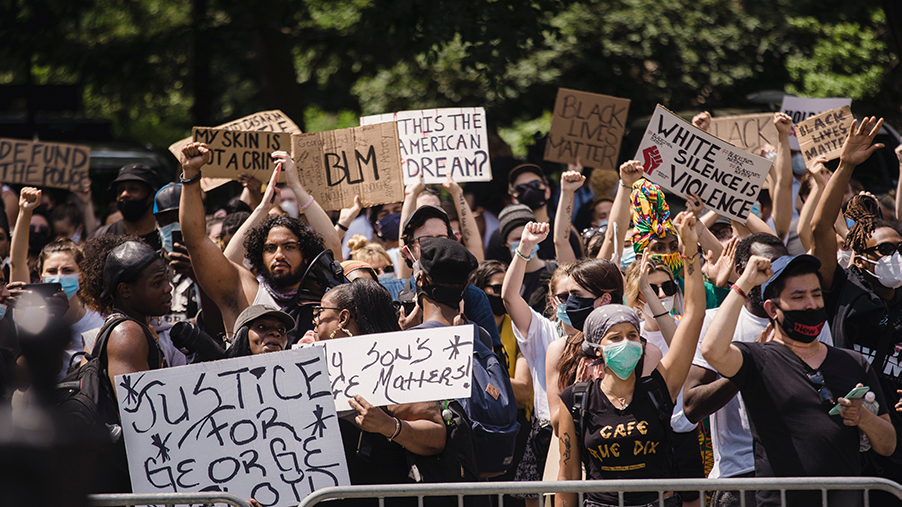 crowd-of-protesters-holding-signs
